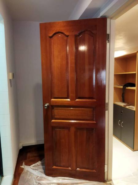 Arched panel door varnished