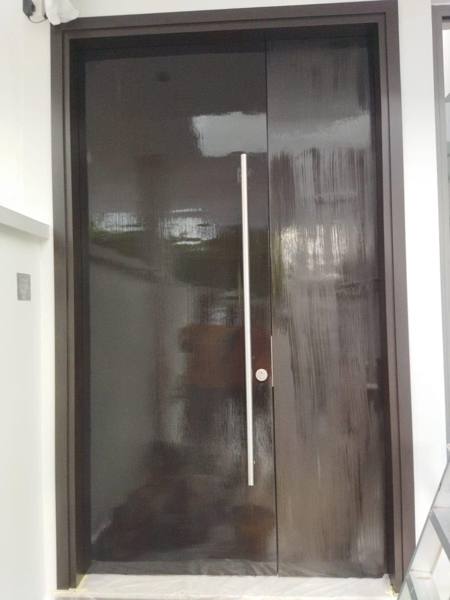 Dark main door varnished