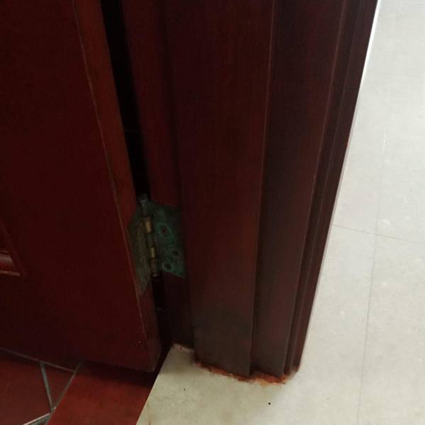 Door frame bottom repair in progress