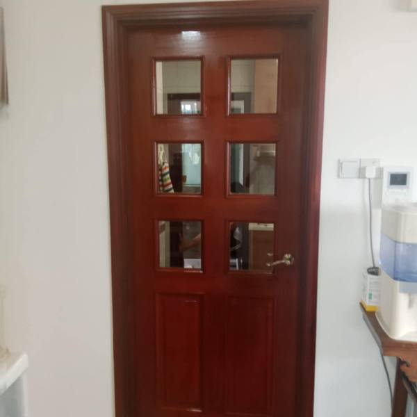 Glass panel kitchen door after re-varnishing